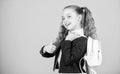 Carrying things in backpack. Learn how fit backpack correctly. Girl little fashionable cutie carry backpack. Popular Royalty Free Stock Photo