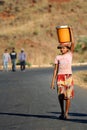 Carrying water Royalty Free Stock Photo