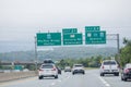 Cars approaching Toll Booth. MACPASS On banner at Toll Plaza. MAC PASS is a E-PASS transponder electronic Royalty Free Stock Photo