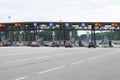 Cars aproaching toll road entry pin on a highway