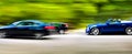 Cars in blurred motion on road. Abstract background. Royalty Free Stock Photo