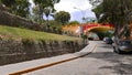 Cars, bridge and gardens in Barranco district of Lima