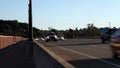 Cars On Bridge Moving Towards Camera Day Time Sped Up