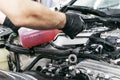 Cars in a carwash. Car wash with foam at station. Carwash. Washing at the station. Car washing concept. Car detailing. A man clean Royalty Free Stock Photo