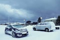 Cars covered with snow