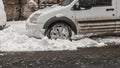 Cars covered in snow, first day of winter