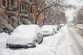 Cars covered in snow during snowstorm Royalty Free Stock Photo