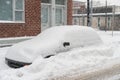 Cars covered in snow during snowstorm Royalty Free Stock Photo