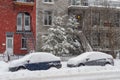 Cars covered in snow during snowstorm Royalty Free Stock Photo