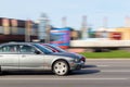 Cars drive at high speeds on the street without observing the permitted speed. Speeding in the city. Motion blur. Riga, Latvia -