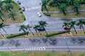 Cars drive on wet road. Raining streets, rainy day.