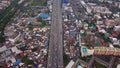 Cars driving on bridge roads with buildings. Aerial view of Expressway Bangna, Klong Toey in structure of architecture concept, U