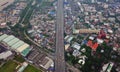 Cars driving on bridge roads with buildings. Aerial view of Expressway Bangna, Klong Toey in structure of architecture concept, U