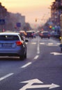 Cars driving on busy city road at dusk Royalty Free Stock Photo