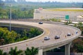 Cars driving on a curvy highway road