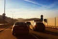 Cars driving down country road Royalty Free Stock Photo