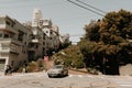 Cars driving down the hairpin turns on famous Lombard Street in San Francisco Royalty Free Stock Photo