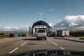 Cars driving on the ferry at Mortavika that is transporting them to ArsvÃÂ¥gen, Norway Royalty Free Stock Photo