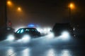 Cars driving in fog Royalty Free Stock Photo