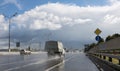 Cars driving on the highway after rain Royalty Free Stock Photo