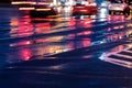 Blurred cars driving on wet road after heavy rain Royalty Free Stock Photo