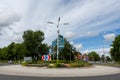 Cars entering a roundabout with traffic direction signs on the van Pallandtlaan in the village of Sassenheim