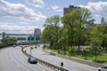 Cars on FDR Drive along East River with a view on lower Manhattan