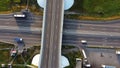 Cars go along the road asphalt bridge, junction. Top view.