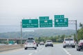 Cars going towards Halifax via Mackay Bridge Toll Plaza. Directions to Halifax, Highway 101, Bedford and Lower Sackville. Royalty Free Stock Photo