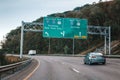 Cars on highway in American USA city country. Road to New York city. Green blue street signs to NY city. Empty road highway on