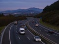 Cars on highway road on sunset evening night Royalty Free Stock Photo