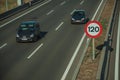 Cars on highway and SPEED LIMIT signpost in Madrid Royalty Free Stock Photo