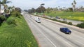 Cars on interstate highway California USA. Intercity freeway transport. Road traffic and greenery. Royalty Free Stock Photo