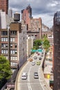 Cars leave Ed Koch Queensboro Bridge entering Manhattan.