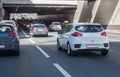 cars leaving tunnel in downtown Royalty Free Stock Photo