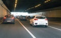 cars leaving tunnel in downtown Royalty Free Stock Photo