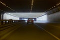 cars leaving tunnel in downtown Royalty Free Stock Photo