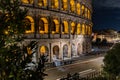 Cars light trails near the Coloseum, Rome, Italy. In Evening Or Night Time. Famous World Landmark. Royalty Free Stock Photo