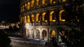 Cars light trails near the Coloseum, Rome, Italy. In Evening Or Night Time. Famous World Royalty Free Stock Photo