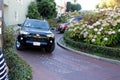 Cars maneuvering down the Lombard Street, Crooked Street, Francisco