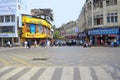 Cars and motorcycles waiting for traffic signal at Laxmi road