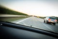 Cars moving fast on a highway