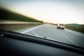 Cars moving fast on a highway