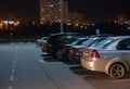 cars at night in parking