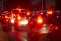 Cars in night traffic jam with abstract bokeh caused by rain drops reflecting Royalty Free Stock Photo