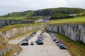 Cars parked in abandoned quarry