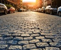 Cars parked along the sidewalk of a historic cobblestone street in the Tribeca neighborhood of Manhattan in New York City Royalty Free Stock Photo