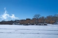 Cars parked on frozen Lake Bemidji near the University on a sunny day