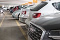 Cars parked inside a multistory car park building Royalty Free Stock Photo