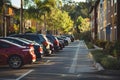 Cars parked next to building with trees and asphalt Royalty Free Stock Photo